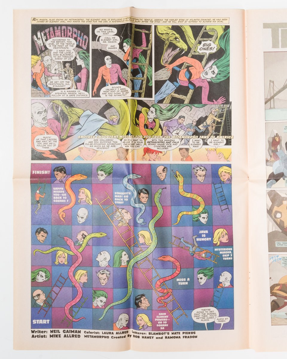 a page of Metamorpho from Wednesday Comics. The bottom half of the page is based on a gameboard of Chutes and Ladders