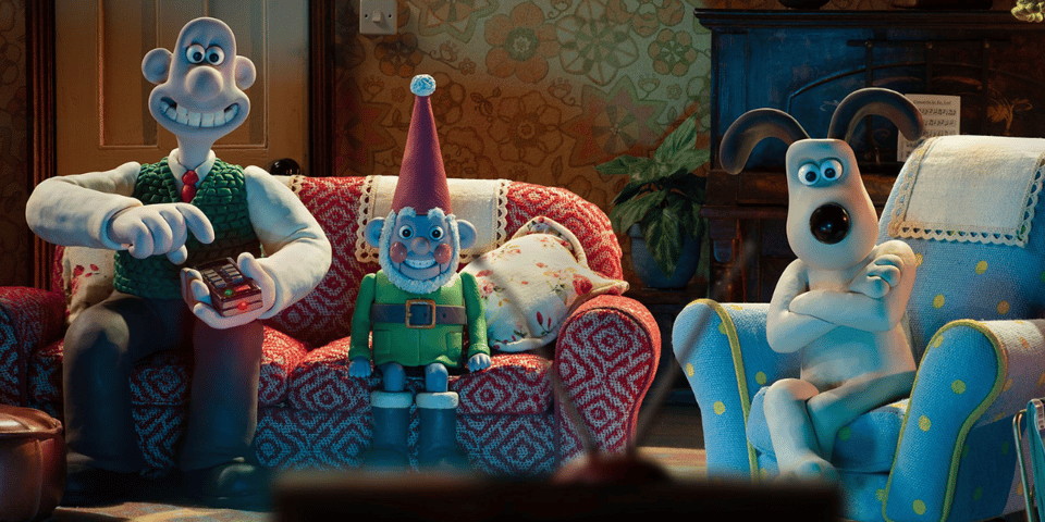Wallace & Gromit watch TV with a garden gnome.