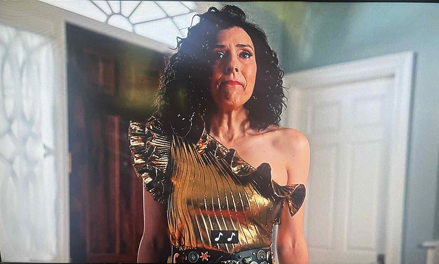 This is a picture I took of my TV while I was watching The Righteous Gemstones. It’s Judy Gemstone in a ridiculous dress.