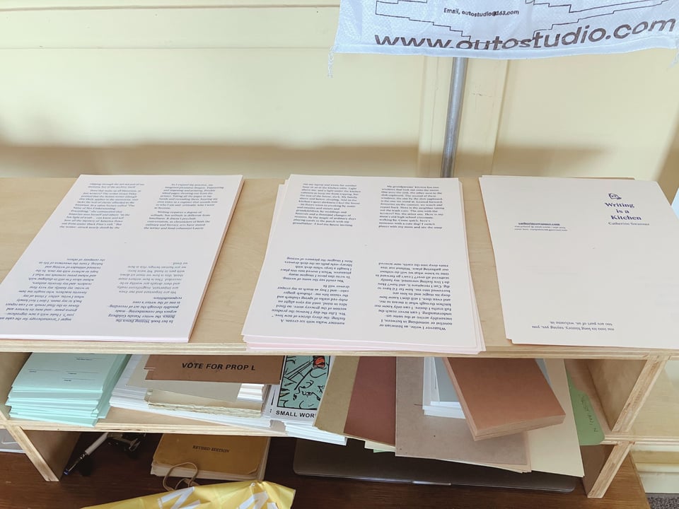 papers spread out on a shelf