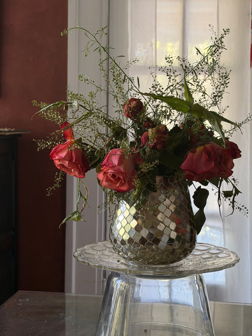 dying flowers in a disco ball