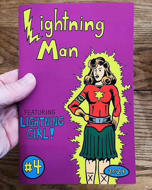 The cover of Lightning Man #4, featuring a super-heroine in a red and green costume, with the words "Featuring Lightning Girl!"