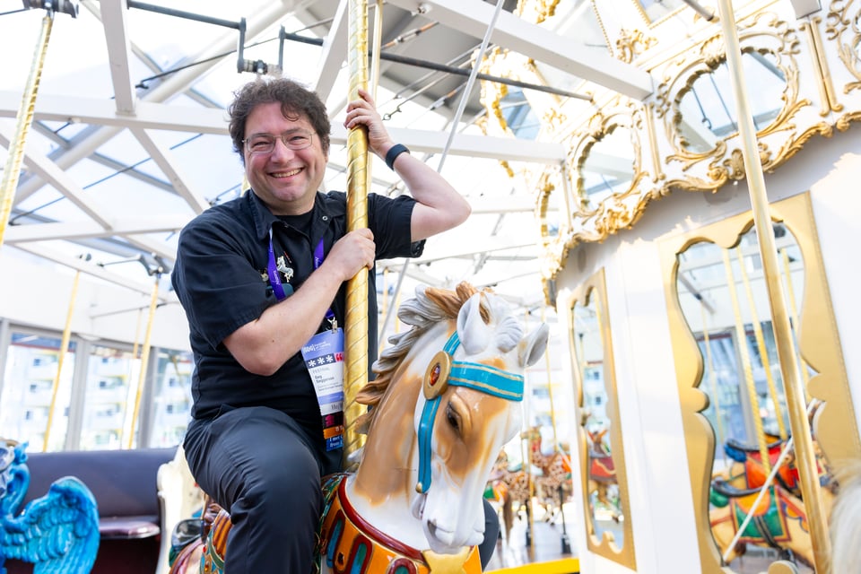 John "Seg" Seggerson riding the Explorer horse on the LeRoy King Carosuel.