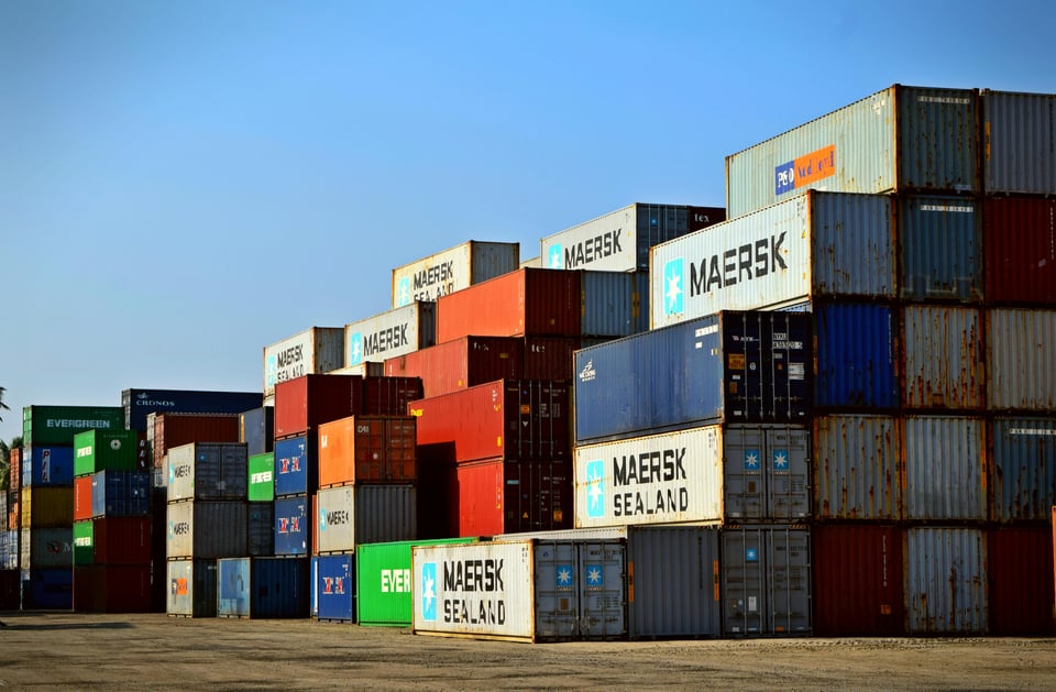 Shipping containers stacked on a dock