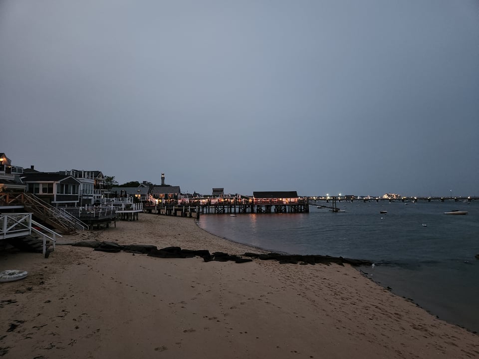 A view down the beach at twilight.