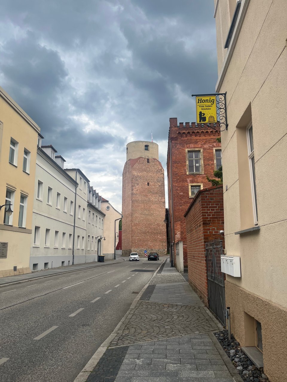 Brick tower at the end of a street