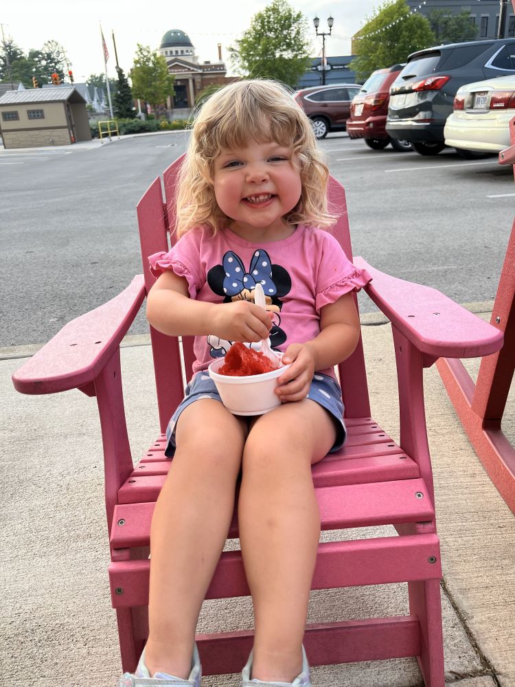 Laurel enjoying a cold treat