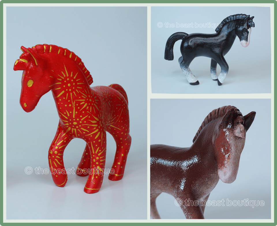 a collage showing three horse figurines from multiple angles. one horse is bright red with golden fireworks painted onto it, seen from the front. the second horse is black, with four white socks and a white blaze on its forehead, seen from the side. the third horse is seen from the front, from the chest up, and is brown with a large white blaze.
the shop name, the beast boutique, watermarks the image