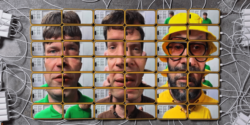The band's faces made up of dozens of phone screens.