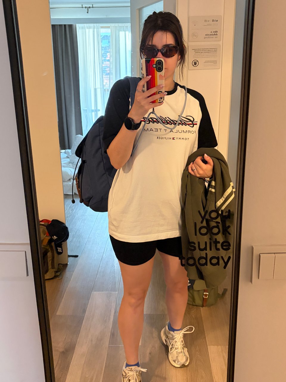 Woman taking a selfie in the mirror