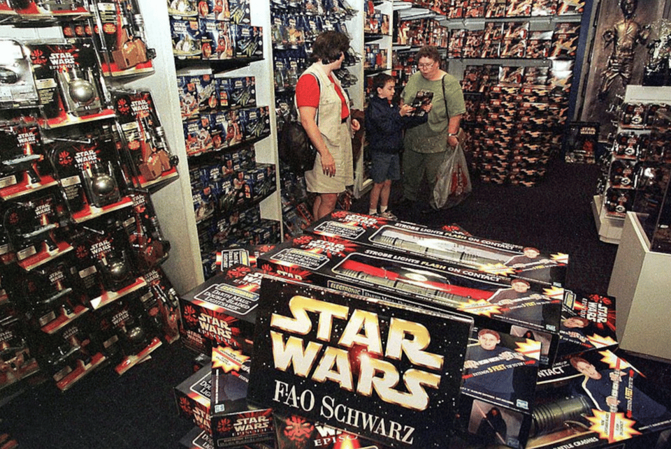 image showing various toys and products from star wars episode 1 the phantom menace in a room at fao schwartz circa 1998 or 1999
