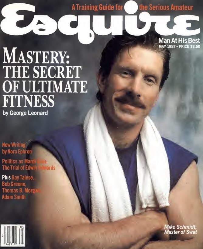 Cover of a 1987 issue of Esquire, featuring a photo of baseball player Mike Schmidt in a sleeveless blue t-shirt and a white towel around his neck