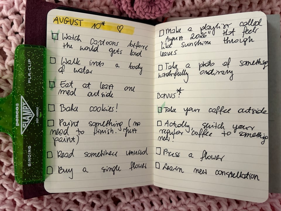 Picture of pages from a notebook with handwritten note on it