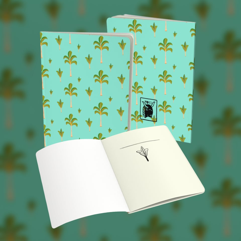 Front and back of a large turquoise notebook with a repeating green, orange, and beige Royal Palm illustration. In the foreground the notebook is open showing he first page inside the notebook that has a line for the user to fill in their name or the title of their notebook and a motif that corresponds to that notebook’s cover.