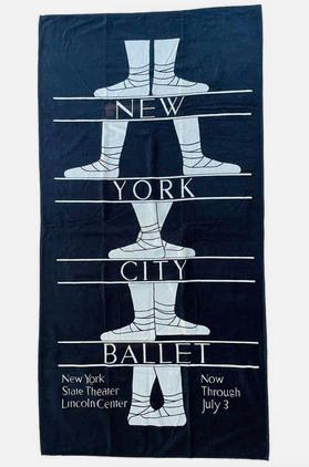 A black and white New York City Ballet beach towel showing feet in ballet positions
