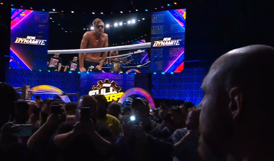 Jon Moxley watches Orange Cassidy strike a defiant pose ahead of their Full Gear 2024 match.