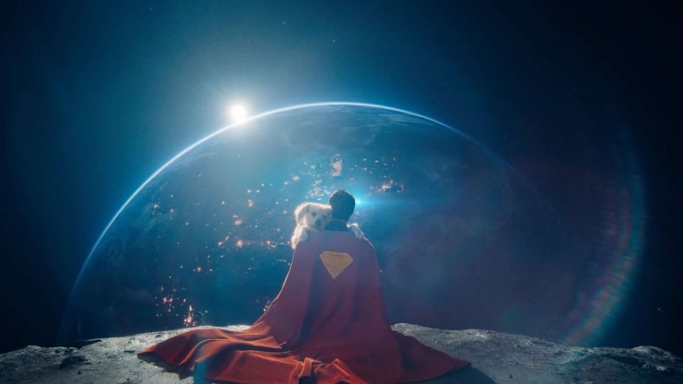 Superman hugging Krypto on the Moon with the Earth in the background.