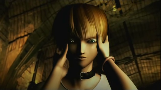 Rion looking down as Lilia holds his face in her hands