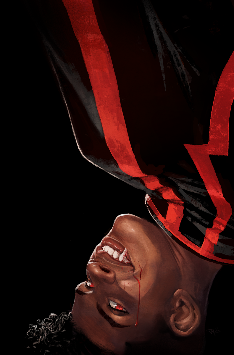 A young Black man with red eyes and vampire fangs hangs upside-down with a trickle of blood running down his cheek