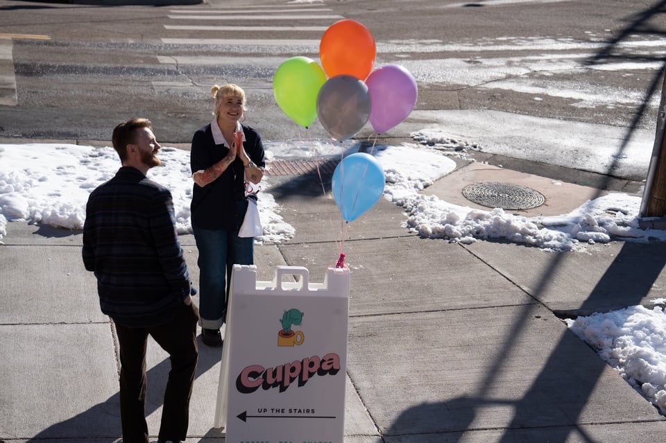 Beth looking lovingly at balloons.