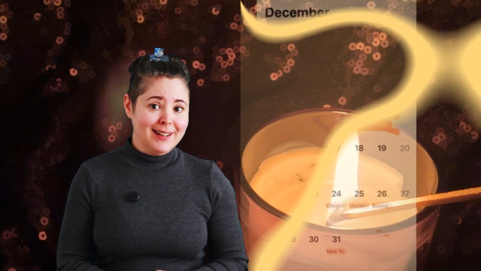 Sparks is superimposed against a dark background of candlelit sequins; a long match lights a candle while an overlaid image of a December calendar appears to be going up in flames.
