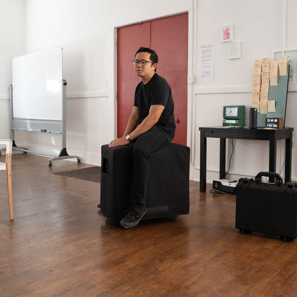 Norton riding a subwoofer.