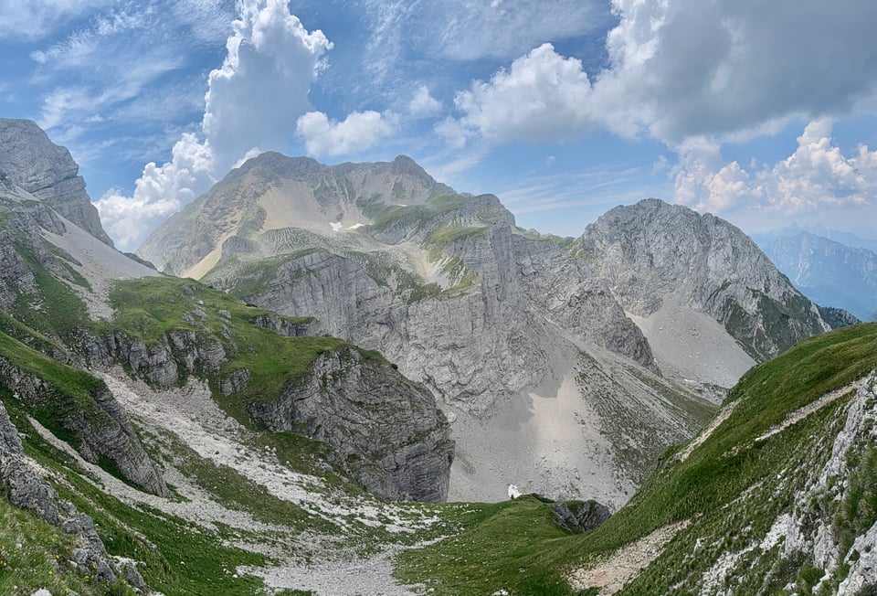 view of a dimpled mountain and green hills