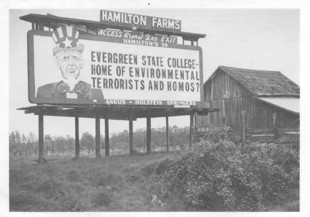 the notorious Hamilton Farms billboard in Washington state. It reads EVERGREEN STATE COLLEGE - HOME OF ENVIRONMENTAL TERRORISTS AND HOMOS?