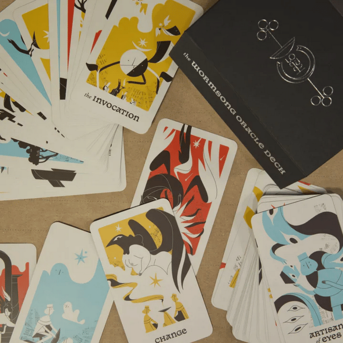 A scattering of cards from the Wormsong Oracle Deck