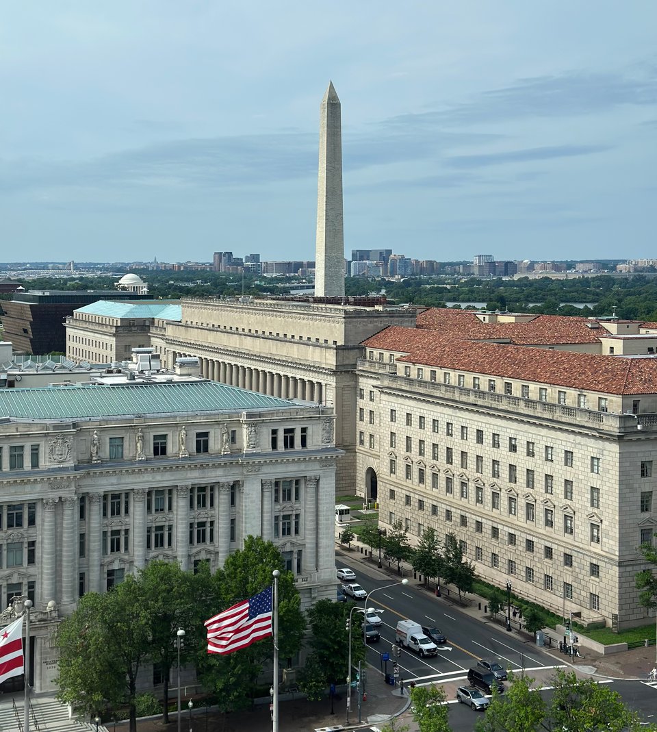 view of Washington Monument from a hotel room on Pennsylvania Ave., with other federal buildings in foreground