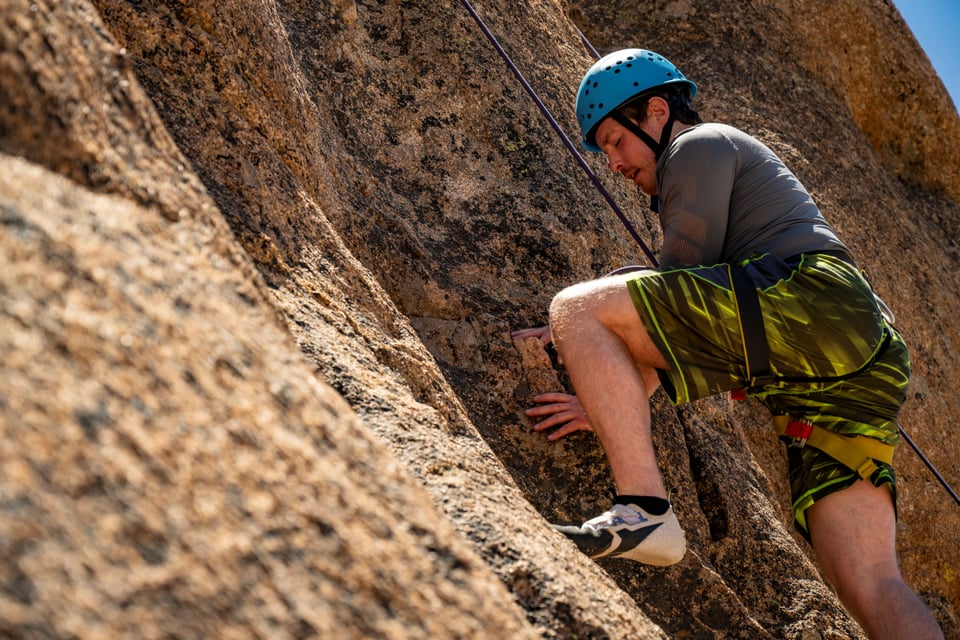 Zach rock climbing in nature