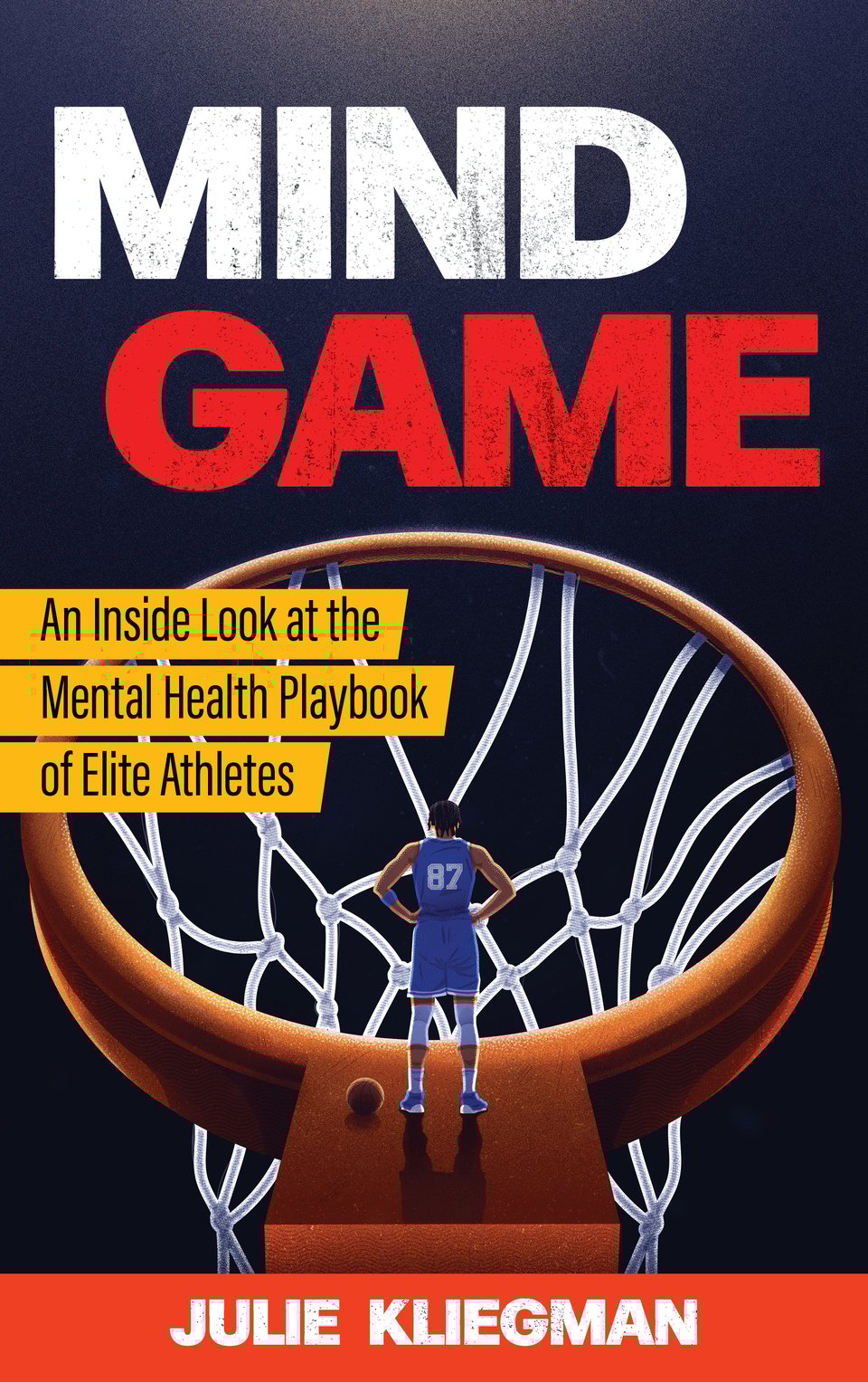 The cover of a book called Mind Game: An Inside Look at the Mental Health Playbook of Elite Athletes by Julie Kliegman. The cover is navy blue with light at the top shining onto an oversized basketball hoop with a black player facing the rim.
