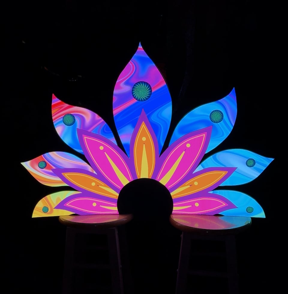 Multicolored lotus animation on black background