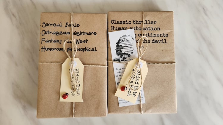 Two books wrapped up in brown paper