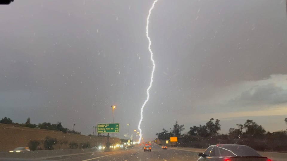 a lightning strike above the highway in Phoenix, 2023.