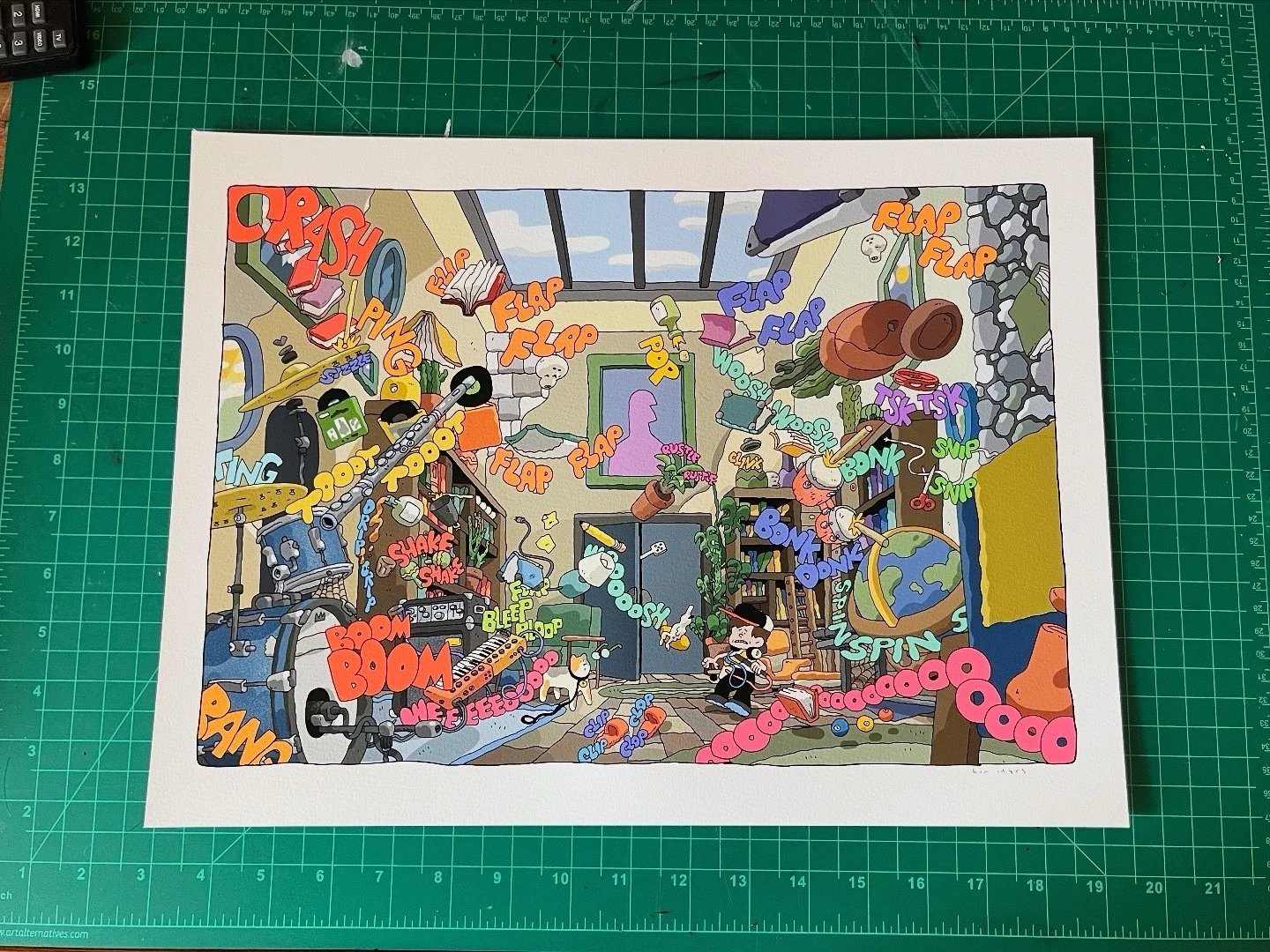 a picture of a print. the print is a spread from the book hearing things, which depicts a kid and a cat getting some field recordings in a haunted house. There are a bunch of objects flying around the room, making all kinds of racket. 