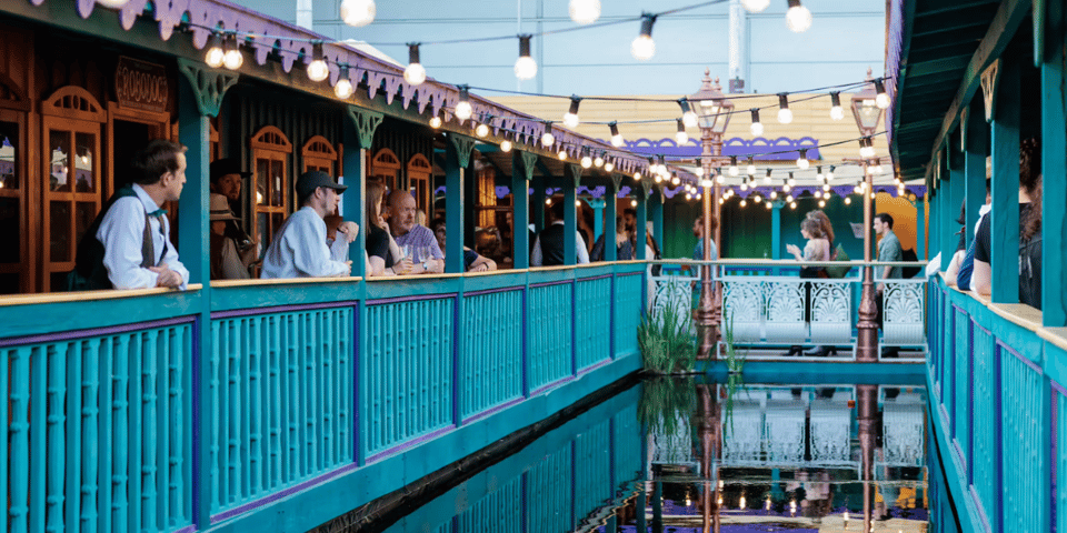 A beautiful Western-style promenade with a reflective water feature at its centre.