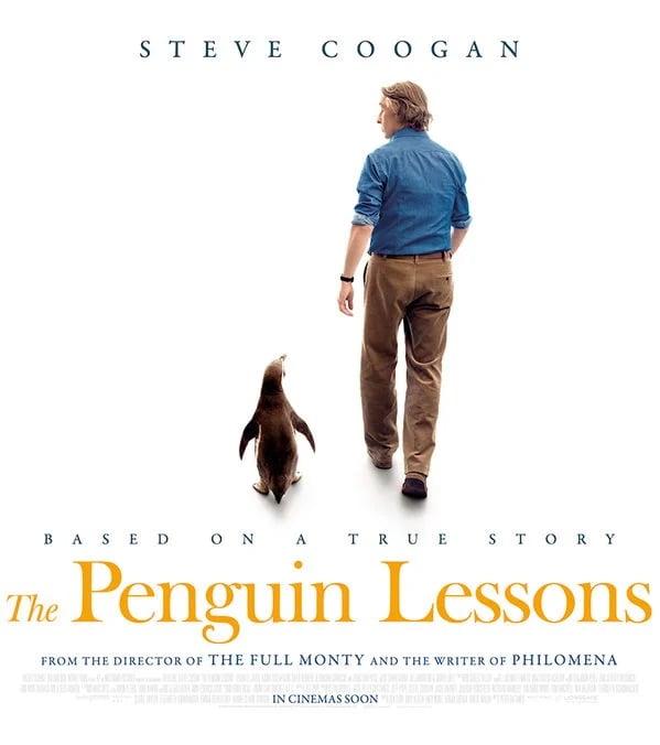 Movie poster for "The Penguin Lessons" showing Steve Coogan from behind walking alongside a penguin, with the film title and "Based on a True Story" text below.