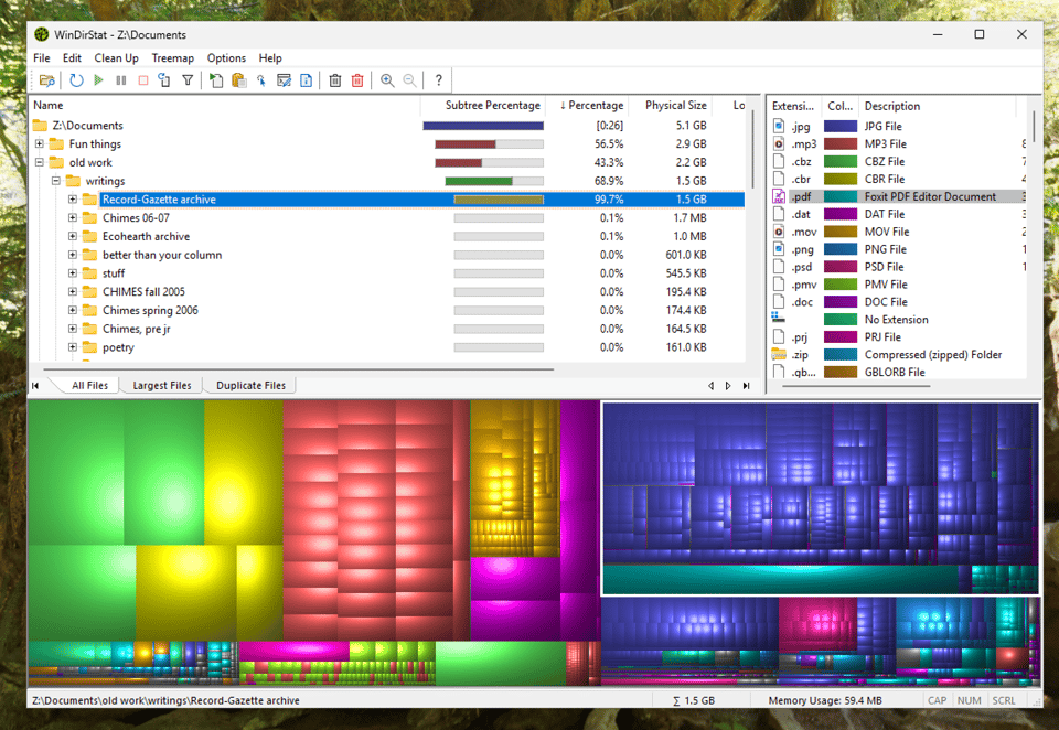 A screenshot of WinDirStat, which shows boxes for every file on the drive helping you find the biggest ones.