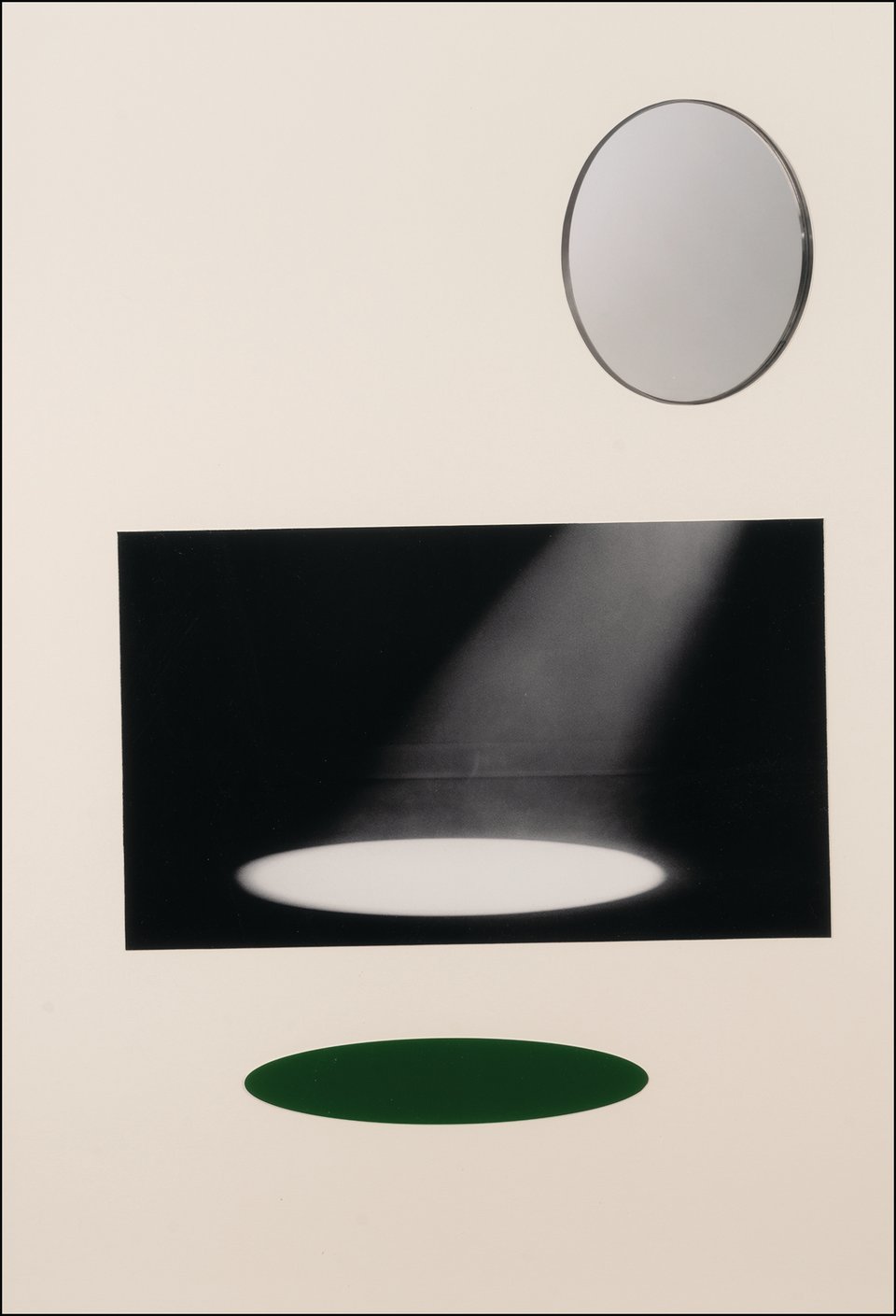 A collage showing an oval mirror with light reflecting off of it, appearing like a spotlight onto a black rectangle. Below the spotlight is a black hole in the same size and shape, almost as if it is its shadow.