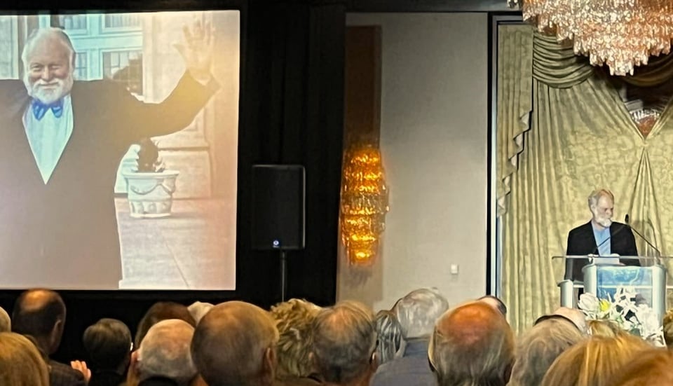 Allan Mayer, the former editor-in-chief of the Edmonton Journal, speaks at a reception in Edmonton honouring our colleague Nick Lees.