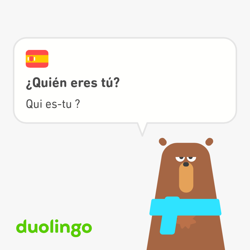 Falstaff, a brown bear with a light blue scarf asks, "Who are you?" in Spanish and French.