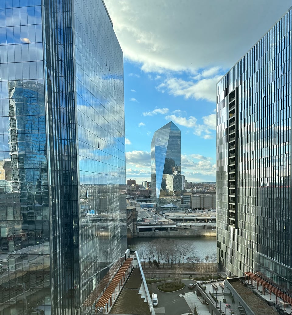 photo of glass buildings and the Schuylkill River in Philadelphia