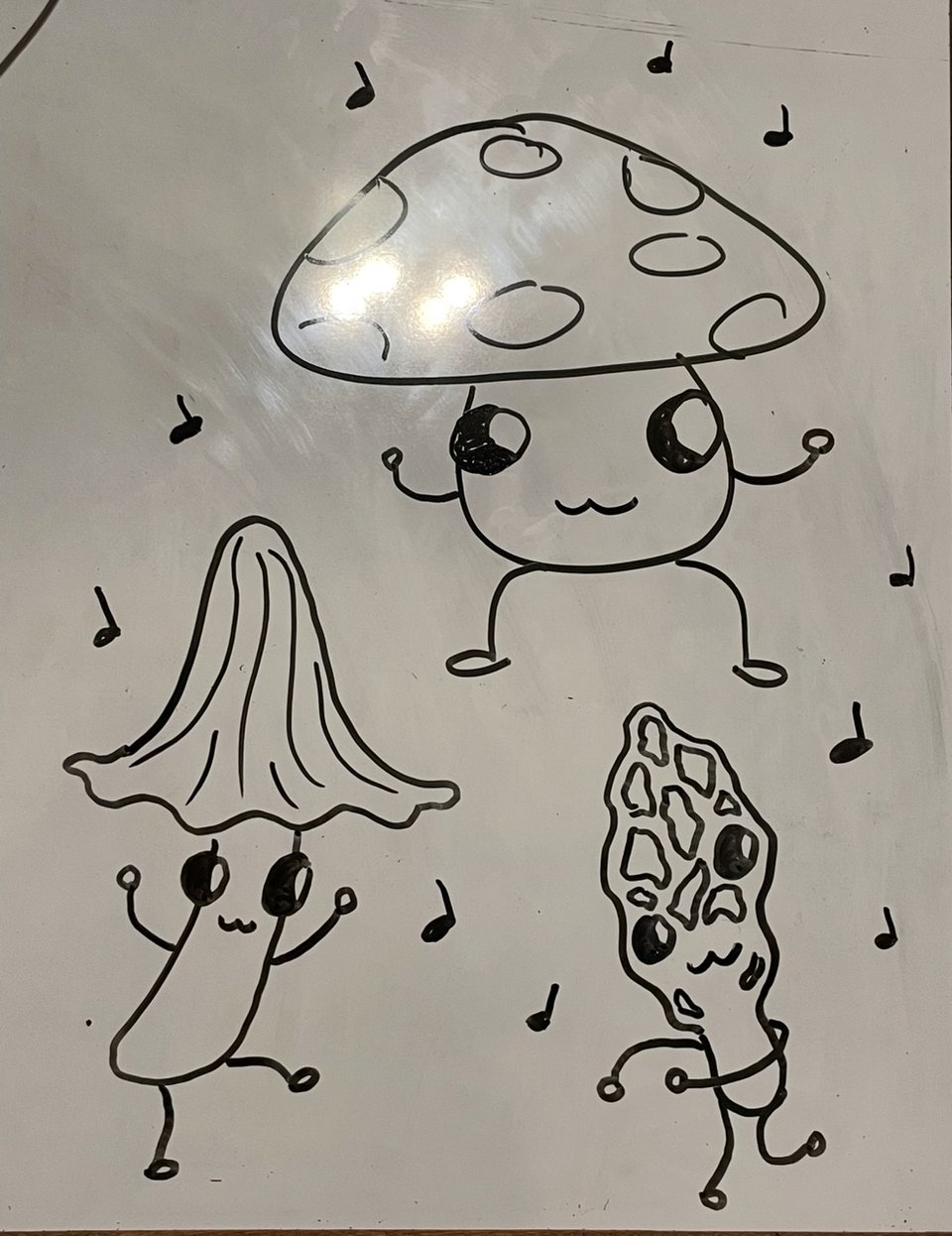 three mushrooms having a dance party