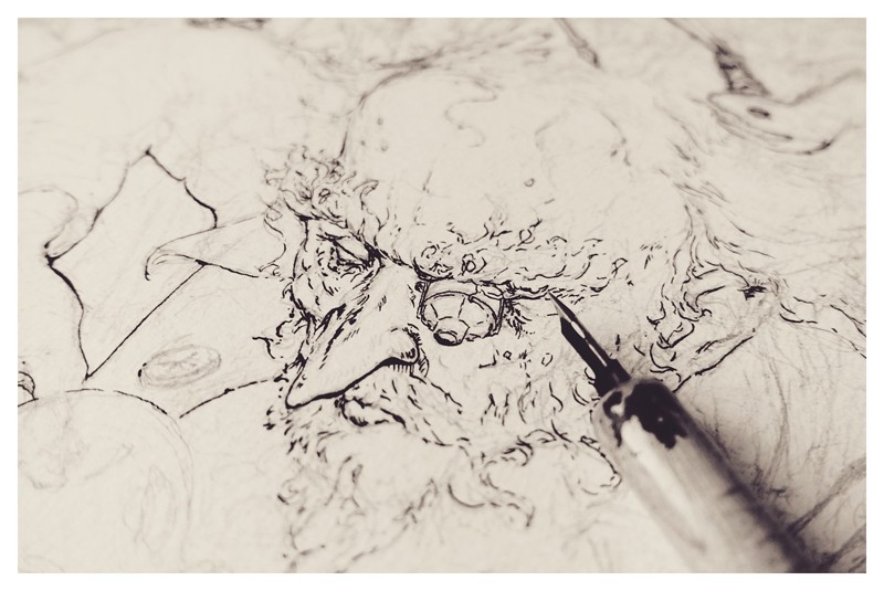 zdjęcie z prac tuszem - twarz starca z lupką w oku