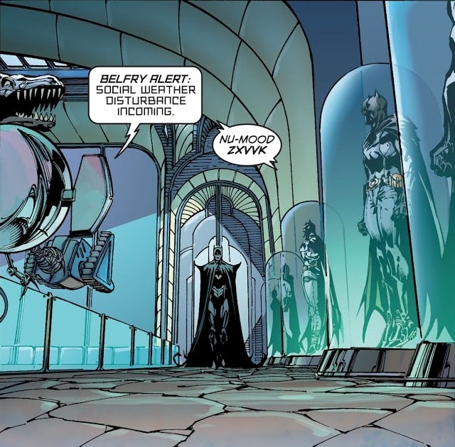 The era's Batman - with a slightly altered costume - walks towards the reader past a rack of Batman costumes on the right, a head of shining T-Rex robot visible on the left. The globelike Bat-Computer declares