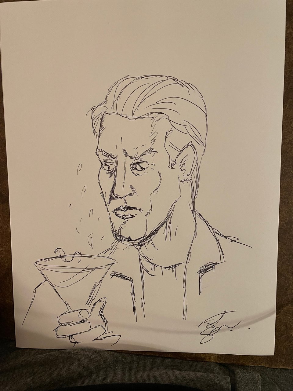 A rough sketch of a pensive 51 year old man holding a martini that is inexplicably jumping out of the glass