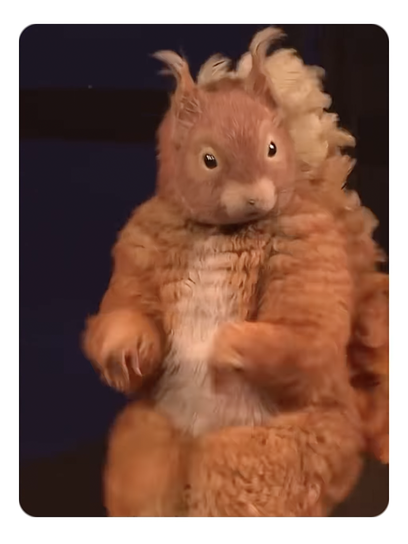 A dancing costumed squirrel