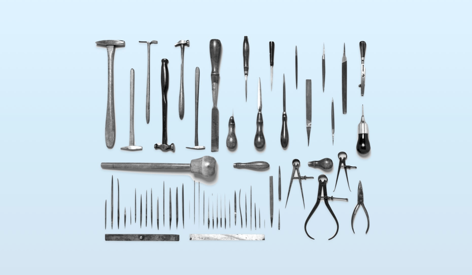 Many tools laid out neatly.