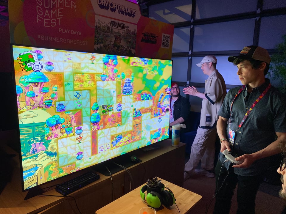David Hellman demoing the game at SGF on a big, vivid TV